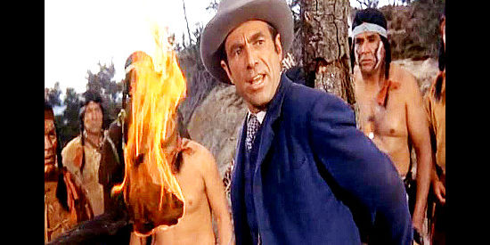 Gary Merrill as John Marsh, trying to talk his way out of being burned at the stake in The Black Dakotas (1954)