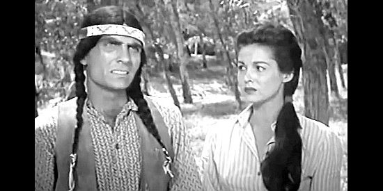 Gene Marlowe as Apache Chief White Star, meeting with government agents as Anne LeBeau (Joan Taylor) looks on in Apache Woman (1955)