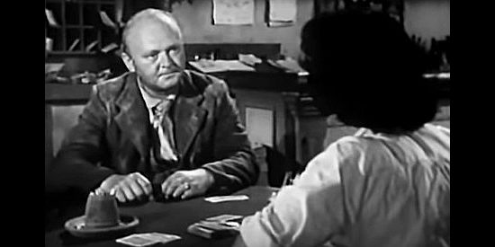George Cisar as Cranston, the traveler who thinks Angela cheated at cards in The Buckskin Lady (1957)
