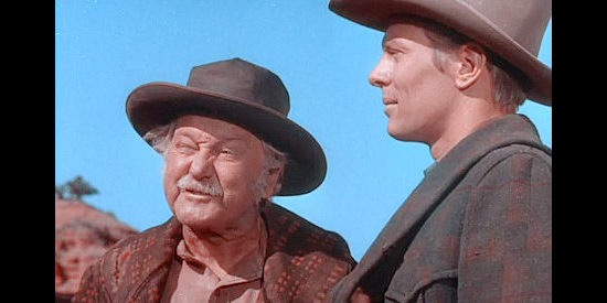 George Cleveland as Charlie Tallon, the older man who looks after Ned (Peter Graves) while his brother is off at war in Fort Defiance (1951)