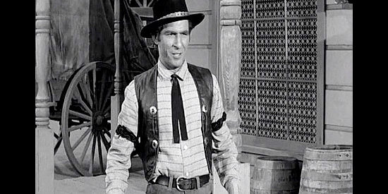 George Keymas as Apache Kid, the hired gun brought in by cattleman Major Bonnard in The Storm Rider (1957)
