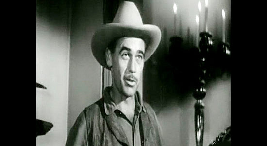 George Lynn as Guthrie, the man trying to rally the homesteaders to stand up to Artemus Taylor in The Bushwhackers (1952)