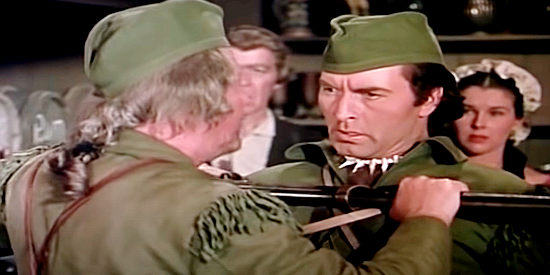 George Montgomery as Capt. Jed Horn, being restrained by Sggt. Wash in Fort Ti (1953)