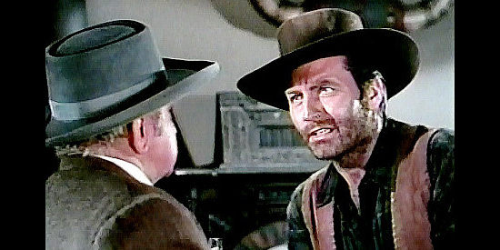 George Montgomery as Cruze, explaining why his last stint as lawman didn't end very well in The Lone Gun (1954)