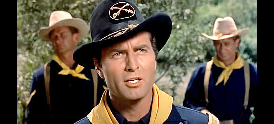 George Montgomery as Maj. Frank Archer, sent to deal with Chief Mike and his troublesome tribe in The Battle of Rogue River (1954)