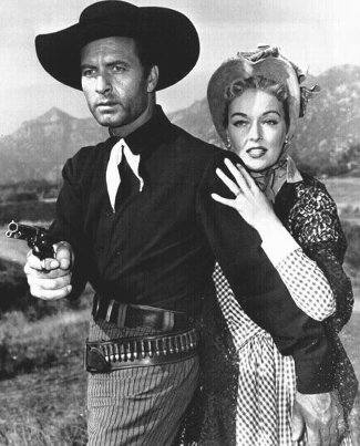 George Montgomery as Pat Garrett and Karin Booth as Lorna Pardee in ...