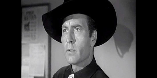 George Montgomery as Pat Garrett, determined to bring the outlaws to their knees in Badman's Country (1958)