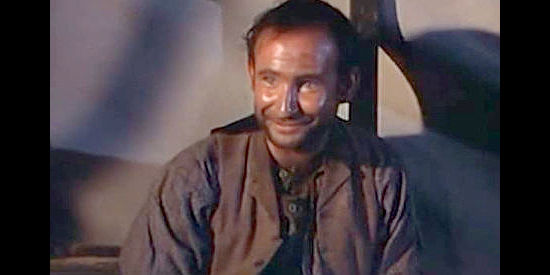 George Stern as Tippy, trying to warn Bob Peters about life at Kruger's mine in Barricade (1950)