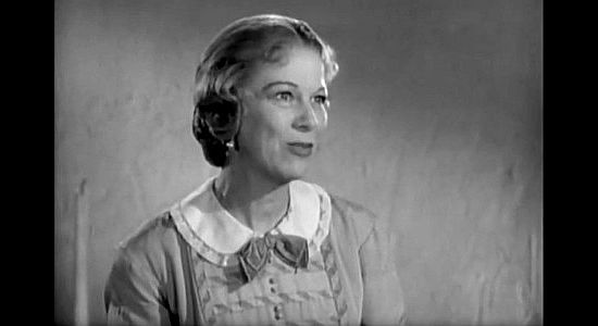 Glenda Farrell as Fanny Webson, a middle-aged woman less harmless than she seems in Apache War Smoke (1952)