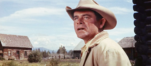 Glenn Ford as Jubal Troop, desperately searching for Mae on his return to the ranch in Jubal (1956)