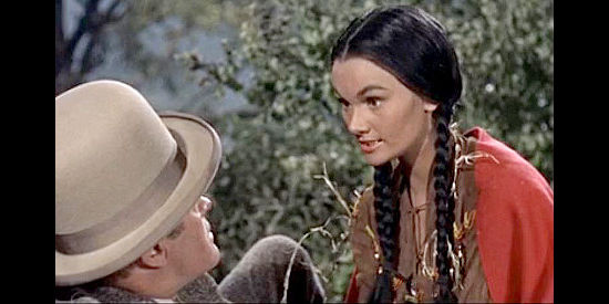 Gloria Talbott as Princess Irawanie, warning MIlford Farnsworth of coming trouble in Alias Jesse James (1959)