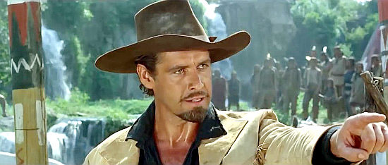 Gordon Scott as Buffalo Bill, issuing a warning to the Sioux chief in Buffalo Bill, Hero of the Far West (1965)