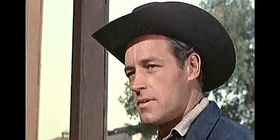 Guy Madison as Steve Burden, a former Texas Ranger who killed a friend accused of murder and now wonders if he was framed in The Hard Man (1957)