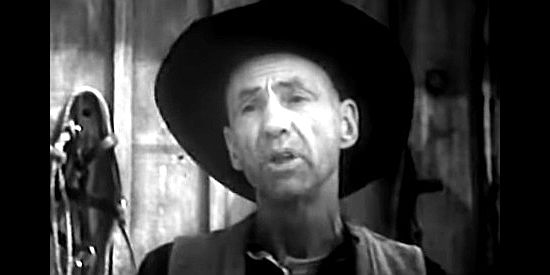 Hank Worden as Lon, blacksmith in Bitter Water in The Buckskin Lady (1957)