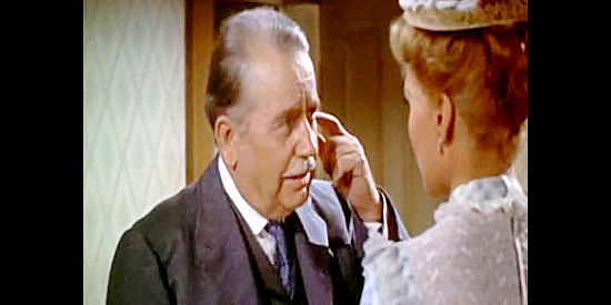 Harry Antrim as Dr. R.L. Spencer, explaining to his daughter why he's keeping a secret in The Bounty Hunter (1954)