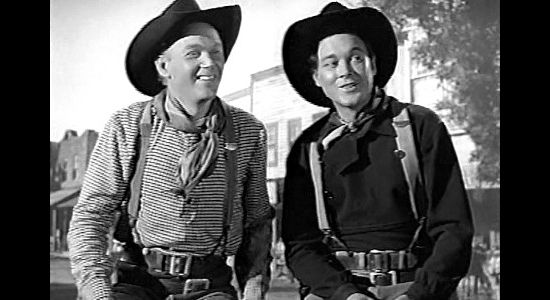 Harry Carey Jr. as Sandy and Ben Johnson as Travis Blue, horse traders who become guides for a Mormon wagon train in Wagon Master (1950)