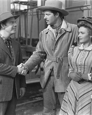 Harry Morgan as Cottonwood Goss, James Craig as Rich Williams and Donna Reed as Mary Lingen in Gentle Annie (1944)
