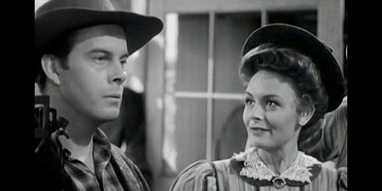 Harry Morgan as Cottonwood Goss confronts a shopkeeper on the behalf of Mary Lingen (Donna Reed) in Gentle Annie (1944)