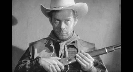 Harry Morgan as Ed Cotton, one of the men guarding the Wells Fargo box in Apache War Smoke (1952)