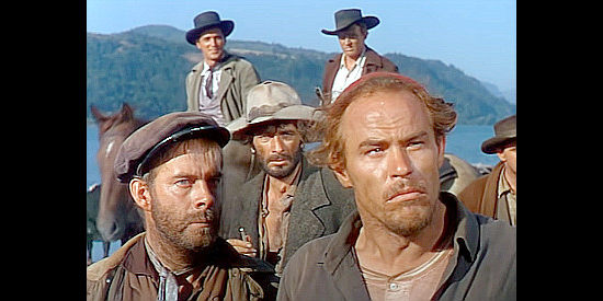 Harry Morgan as Shorty, Royal Dano as Long Tom and Jack Lambert as Red, three men hired to help escort supplies to the farmers in Bend of the River (1952)