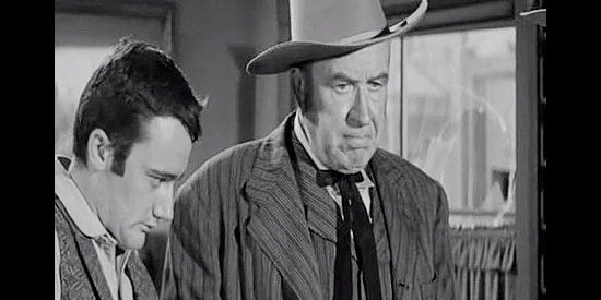 Harry Shannon as Clay Ford, fretting over the safety of his son Bob (Robert Vaughn, left) in Hell's Crossroads (1957)