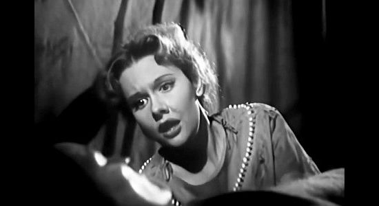 Helen Westcott as Winifred Lancaster, reacting to another member of the Ottawa tribe succumbing to small =pox in Battles of Chief Pontiac (1952)