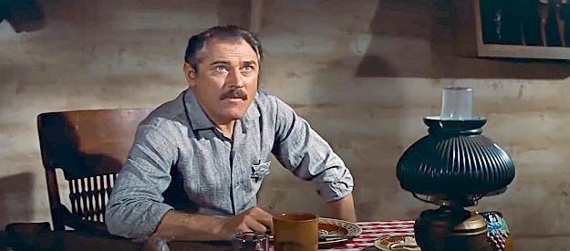 Herbert Rudley as Sheriff Sanchez, wondering why Jim Douglass has traveled to Rio Ariba in The Bravados (1958)