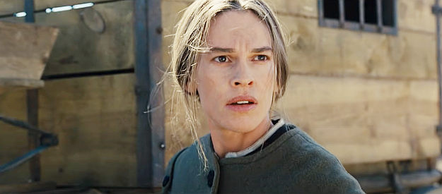 Hilary Swank as Mary Bee Cuddy, meeting George Briggs with a noose around his neck in The Homesman (2014)