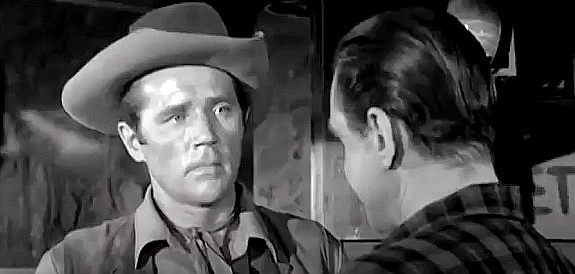 Howard Duff as Deputy Frank Smeed, confronted by an ally of cattle king Thornton Wills in The Broken Star (1956)