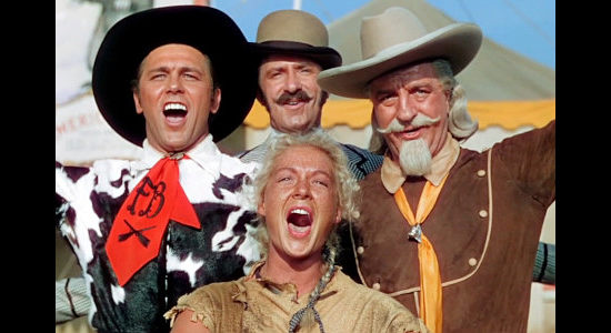 Howard Keel as Frank Butler and Betty Hutton as Annie Oakley with Charlie Davenport (Keenan Wynn) and Buffalo Bill (Loius Calhern)