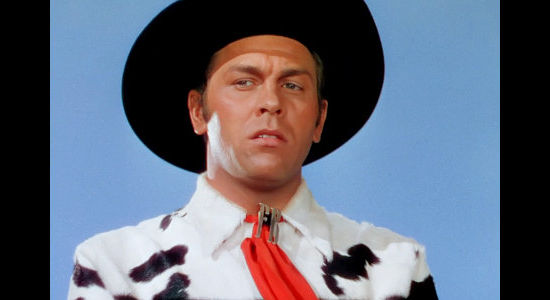 Howard Keel as Frank Butler, unsure how to handle losing a shooting match to a girl from the backwoods in Annie Get Your Gun (1950)