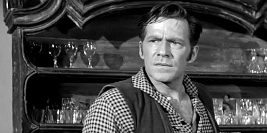 Hugh Marlowe as Lorn Crawford, learning the black legs expect him to help kidnap, and perhaps kill, a governor in The Black Whip (1956)