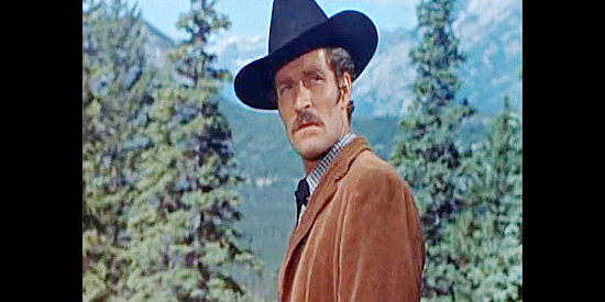 Hugh O'Brian as Marshal Carl Smith, determined to bring in Grace Markey for the murder of his brother in Saskatchewan (1954)