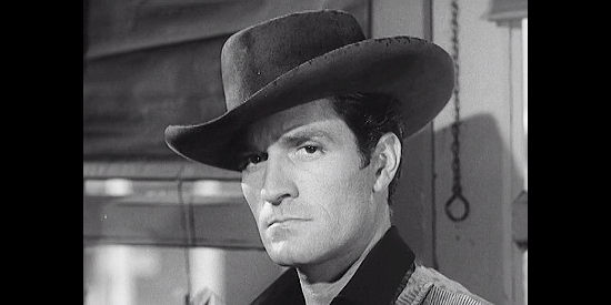 Hugh O'Brian as Wade Adams, sheriff of Apache Bend in The Brass Legend (1956)
