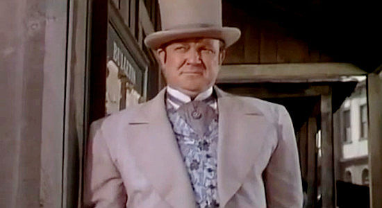 Hugh Sanders as Asa Goodhue, the man competing with Jackson Redan for freighting business in Sugarfoot (1951)