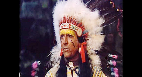 Ian McDonald as Chief Yellow Eagle, Ahern's adoptive father, questioned about his white son's loyalty in The Savage (1952)