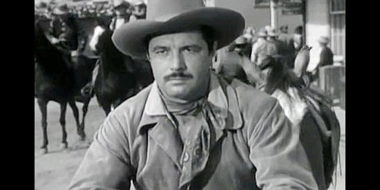 James Craig as Lloyd Richland, wondering if he'll ever see the girl he's fallen for again in Gentle Annie (1944)