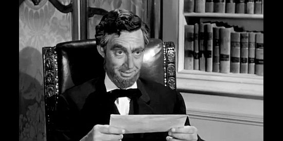 James Griffith as Abraham Lincoln, assigning James Kingston a special mission in Apache Ambush (1955)