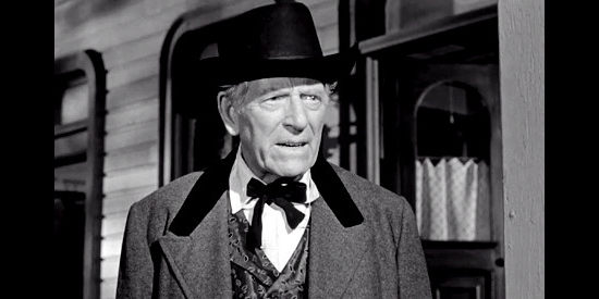 James Kirkwood as Judge Parker, inquiring about the posse's experience in The Last Posse (1953)