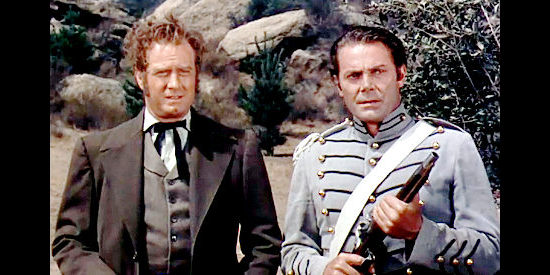 James Seay as Gov. Harrison and Jon Hall as Steve Ruddell, trying to keep the U.S. out of a war with the British in Brave Warrior (1952)