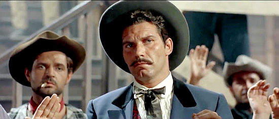 Jan Hendriks as Monroe, saloon owner and man behind the gun running in Buffalo Bill, Hero of the Far West (1965)
