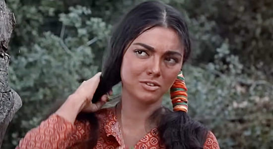 Jana Davi as Rosita, warry of the white man who has rescued her in Gunmen from Laredo (1959)