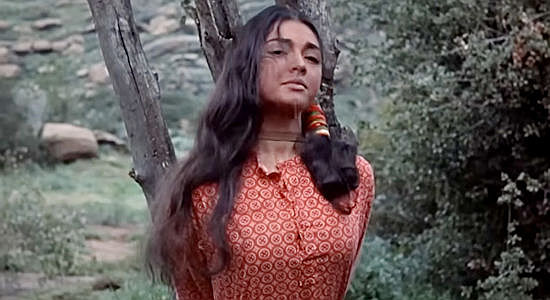 Jana Davi, tied to a tree for safe keeping while her Indian'husband' goes hunting in Gunmen from Laredo (1959)