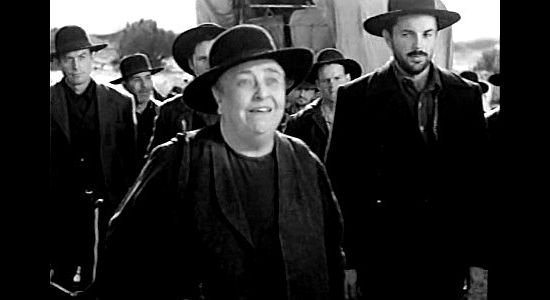 Jane Darnell as Sister Ledyard, the woman who blows a bugle to start each day's journey in Wagon Master (1950)
