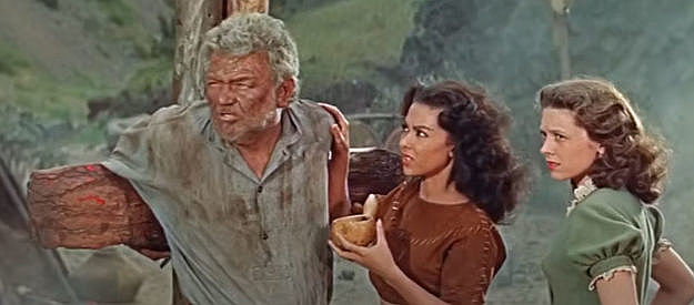Jay Flippen as Tom Hutter with daughters Hetty (Rita Moreno) and Judith (Cathy O'Donnell), fearing the fate that awaits them as captives of the Hurons in The Deerslayer (1957)