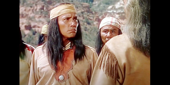 Jay Silverheels as Geronimo in a disagreement with Cochise in Broken Arrow (1950)
