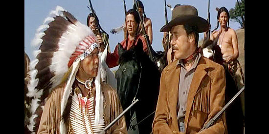 Jay Silverheels as Satana, a Kiowa chief conferring with Capt. Corwin (James Bannon), a renegade white man, in War Arrow (1953)