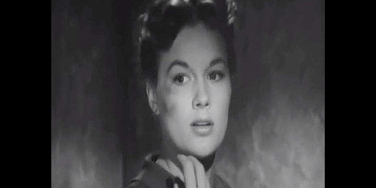 Jean Hagen as Martha Conovan, the woman who refuses to leave her abusive husband in Ambush (1950)
