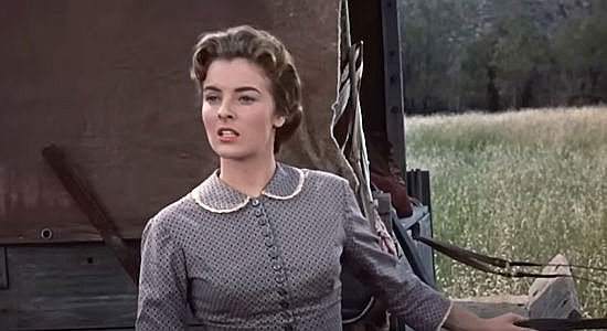 Jean Moorhead as Katy Reardon, watching rustlers approach her wagon in Gunmen from Laredo (1959)