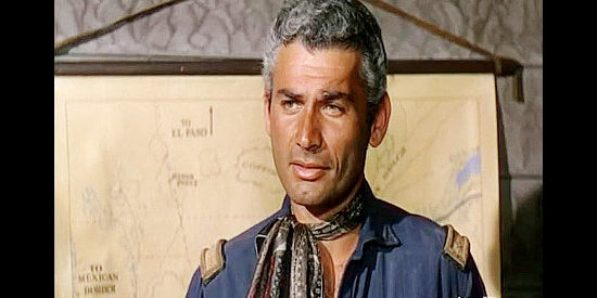 Jeff Chandler as Maj. Howell Brady, sent West with two comrades to find a new way of taming the Kiowa in War Arrow (1953)